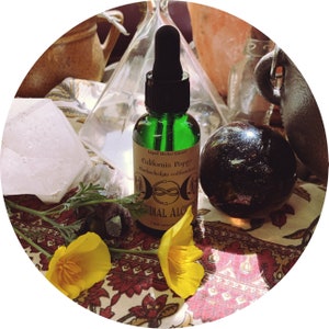 May include: A green glass bottle with a dropper, labeled "California Poppy (Eschscholzia californica)" and "Lunar Alchemy". The bottle is surrounded by crystals, flowers, and other decorative items.