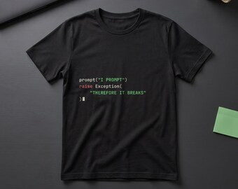 May include: A black short-sleeved t-shirt featuring white and red computer code text that reads: prompt("I PROMPT") raise Exception("THEREFORE IT BREAKS") ). The design is centered on the chest of the shirt, which has a crew neckline.