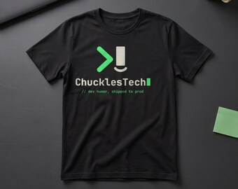 May include: A black short-sleeved t-shirt featuring a graphic with a green greater-than symbol, a white vertical bar, and the text ChucklesTech followed by a green square. Below, the text reads // dev humor, shipped to prod.