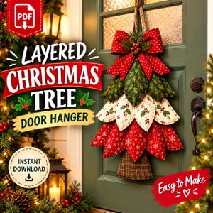 May include: A layered Christmas tree door hanger craft pattern featuring a red polka dot bow, green leaf-shaped fabric layers with gold patterns, cream layers with holly prints, red layers with white snowflakes, and a brown plaid base.