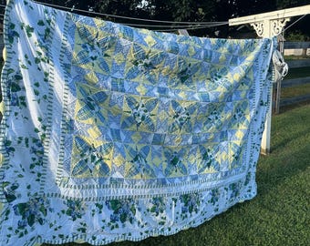 Vintage Laura Ashley  pattern light blue, yellow, white and green quilt.  90 x 98