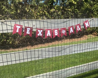 Texas A & M Bound or 2026 banner. Officially licensed