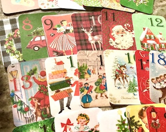 May include: A set of vintage Christmas cards featuring various holiday scenes, including a reindeer, Santa Claus, a house, and a family of children. The cards are numbered from 1 to 18.