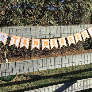 May include: A set of three ceramic mugs with a speckled, matte finish. The mugs are in shades of cream, light gray, and dark gray. Each mug has a simple, minimalist design, perfect for coffee or tea.