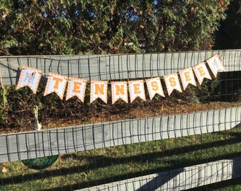 University of Tennessee orange and white gingham  banner garland party decor. Officially licensed