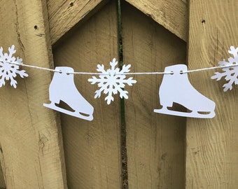 Ice skates and snowflakes garland banner