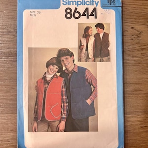 May include: A Simplicity 8644 sewing pattern envelope for a vest in size 36. The blue and white packaging features illustrations of two individuals wearing quilted vests over plaid shirts, with a smaller inset showing two additional vest styles.