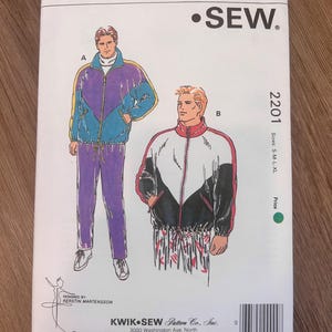 May include: A Kwik Sew pattern envelope 2201 for sizes S-M-L-XL. The front shows two illustrations of tracksuits: one purple and teal, the other white, black, and red with a patterned pant. Includes the text Kwik Sew, Pattern 2201, and address details.