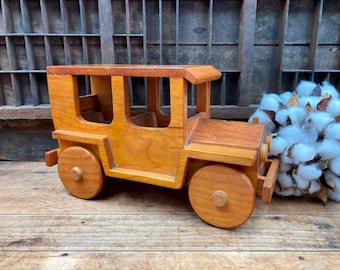 Vintage Wooden Toy Car: Handmade Folk Art Display