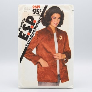 May include: A Simplicity 9619 sewing pattern envelope featuring a brown jacket with a stand-up collar, long sleeves, and two large front patch pockets. The text on the envelope includes Simplicity, E.S.P., Extra-Sure Pattern, and size N.