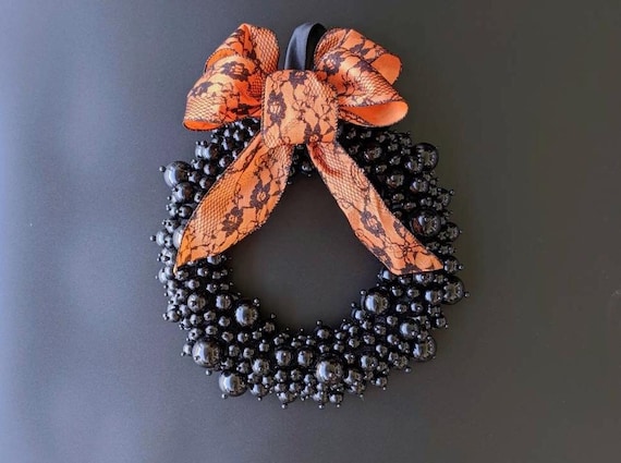 Black Pearl Halloween Wreath with Orange Lace Ribbon