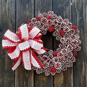 Red and White Pine Cone Christmas Wreath with Lace Bow