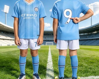 May include: A light blue soccer jersey with white trim, the Etihad Airways logo, and a team crest, paired with white shorts featuring a number 7 and light blue socks. The back of the jersey displays the number 9 in large white font.