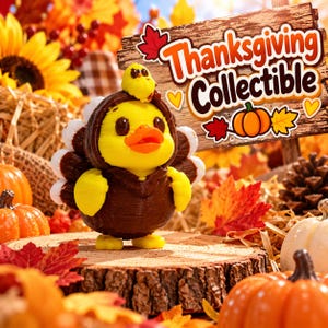 May include: A yellow duck figurine wearing a brown turkey costume with a small yellow chick on its head. A wooden sign behind the duck features the text Thanksgiving Collectible, decorated with a pumpkin, maple leaves, and yellow hearts.