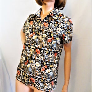 60s 70s Short Sleeve Top, Big Pointed Collar, Black Orange Gold Polyester Knit Flower Power Print Alex Coleman Button Up Blouse Shirt medium
