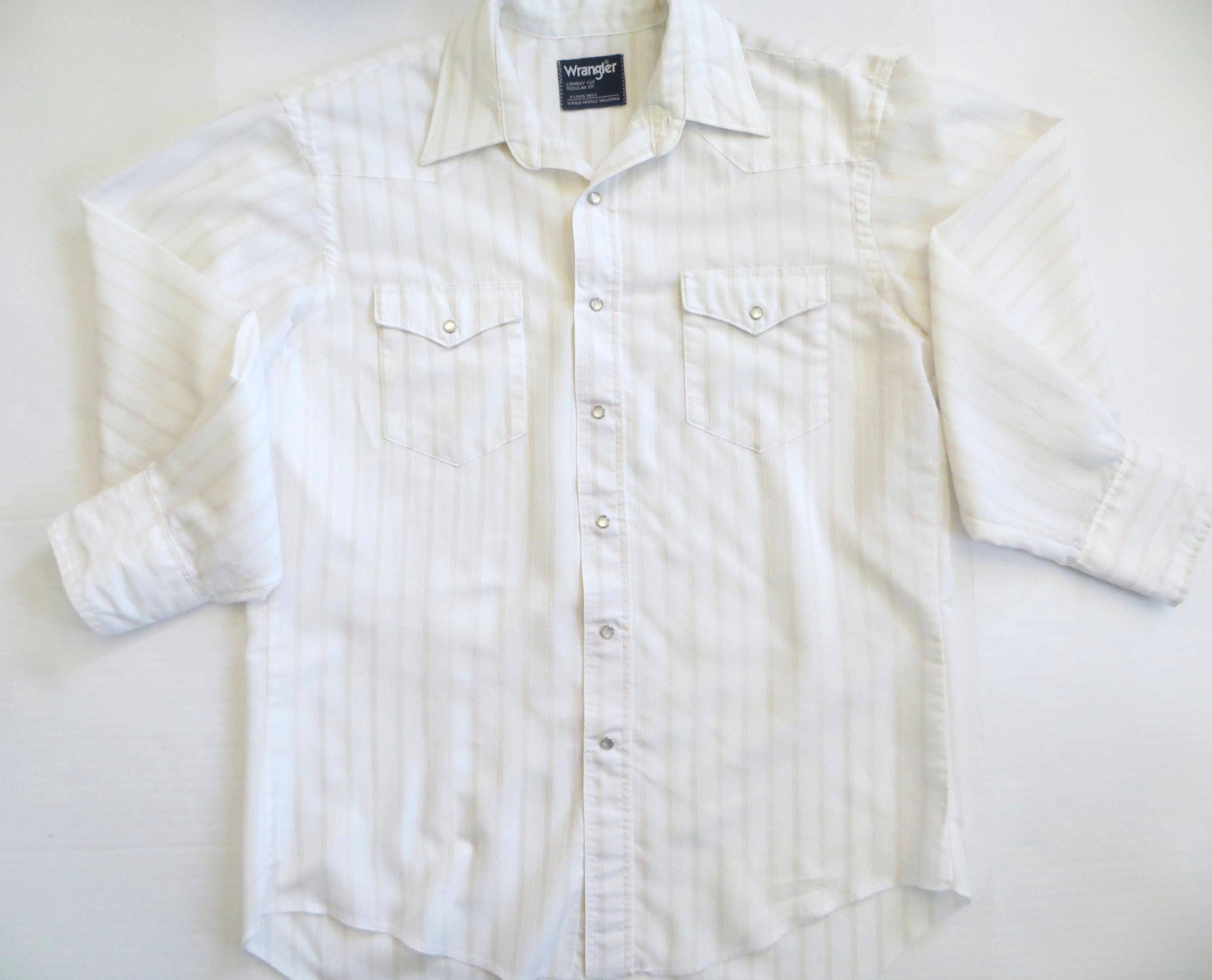 white pearl snap dress shirt Cream Ruffle Front Top | Tencel Flouncy Sleeve Authentic Western front and back yokes Pearl Snap Cowboy Shirt |