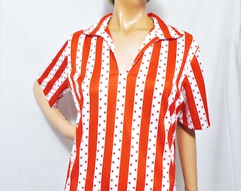May include: A red and white striped shirt with white polka dots. The shirt has a collar and short sleeves.
