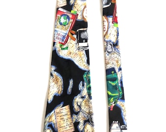Nicole Miller Silk Necktie: Embossed Traveler Theme, Mint Condition