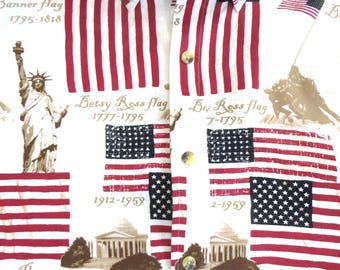 May include: A white button-up shirt with a pattern of American flags and historical images. The shirt features the Star-Spangled Banner, Betsy Ross flags, and the text "July 4, 196".