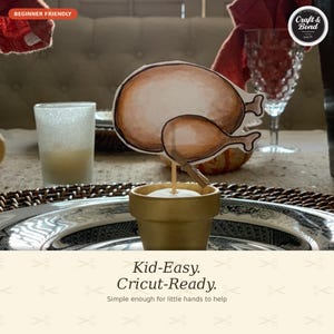 May include: A paper cutout of a roasted turkey attached to a wooden stick, secured in a small gold-colored pot. The cutout features brown watercolor-style shading. Text on the image includes "BEGINNER FRIENDLY", "Craft & Bond", and "Kid-Easy. Cricut-Ready."