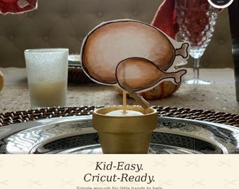 May include: A paper cutout of a roasted turkey attached to a wooden stick, secured in a small gold-colored pot. The cutout features brown watercolor-style shading. Text on the image includes "BEGINNER FRIENDLY", "Craft & Bond", and "Kid-Easy. Cricut-Ready."