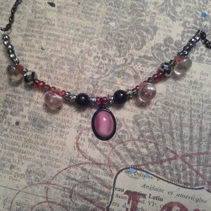 Vintage 1940&#39;s Pink Opal Glass in Repurposed / Upcycled with Red Iridescent Teardrop Accents on Black Patina Necklace