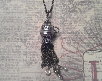Discounted-Overturned Abstract Spilled Tea Cup Tassel Pendant with Rhinestone Beaded Accents on Gunmetal Silver Necklace