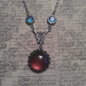 Titania&#39;s Trinket. Vintage Dragon&#39;s Breath Jelly Opal Glass with Silver Filigree Connector and Blue Crystal Accents Necklace