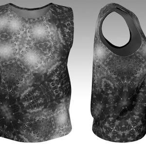 May include: Sleeveless tank top with a black and white abstract pattern. The design features a complex arrangement of geometric shapes and starburst-like elements, creating a visually dynamic effect. The top has a scoop neck and a racerback design.