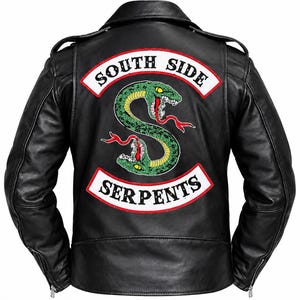 May include: A black leather jacket featuring a large embroidered patch on the back. The patch displays a green snake shaped like the letter S, with the text SOUTH SIDE above and SERPENTS below in black lettering on white banners.