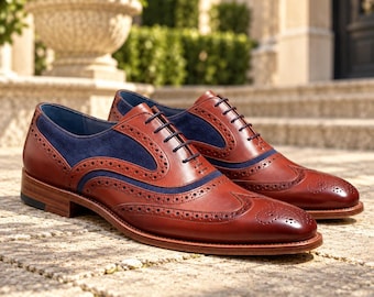 Tweekleurige Oxford-schoenen met vleugelneus voor heren, palissanderhouten leer en marineblauwe suède brogues.