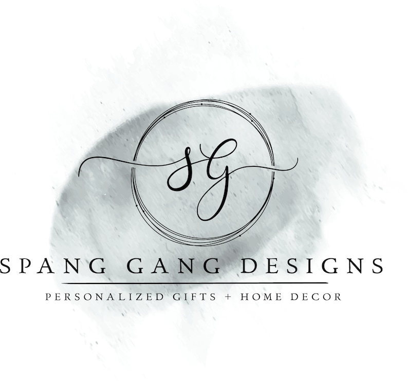 May include: A logo for a business called "Spang Gang Designs" that specializes in personalized gifts and home decor. The logo features a circle with the letters "SG" inside and a watercolor background.