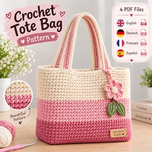 May include: A crochet tote bag pattern featuring a three-tone color block design in cream, light pink, and dark pink. The bag has two handles and a decorative pink flower with two green leaves attached. Text includes Crochet Tote Bag Pattern and 4 PDF Files.