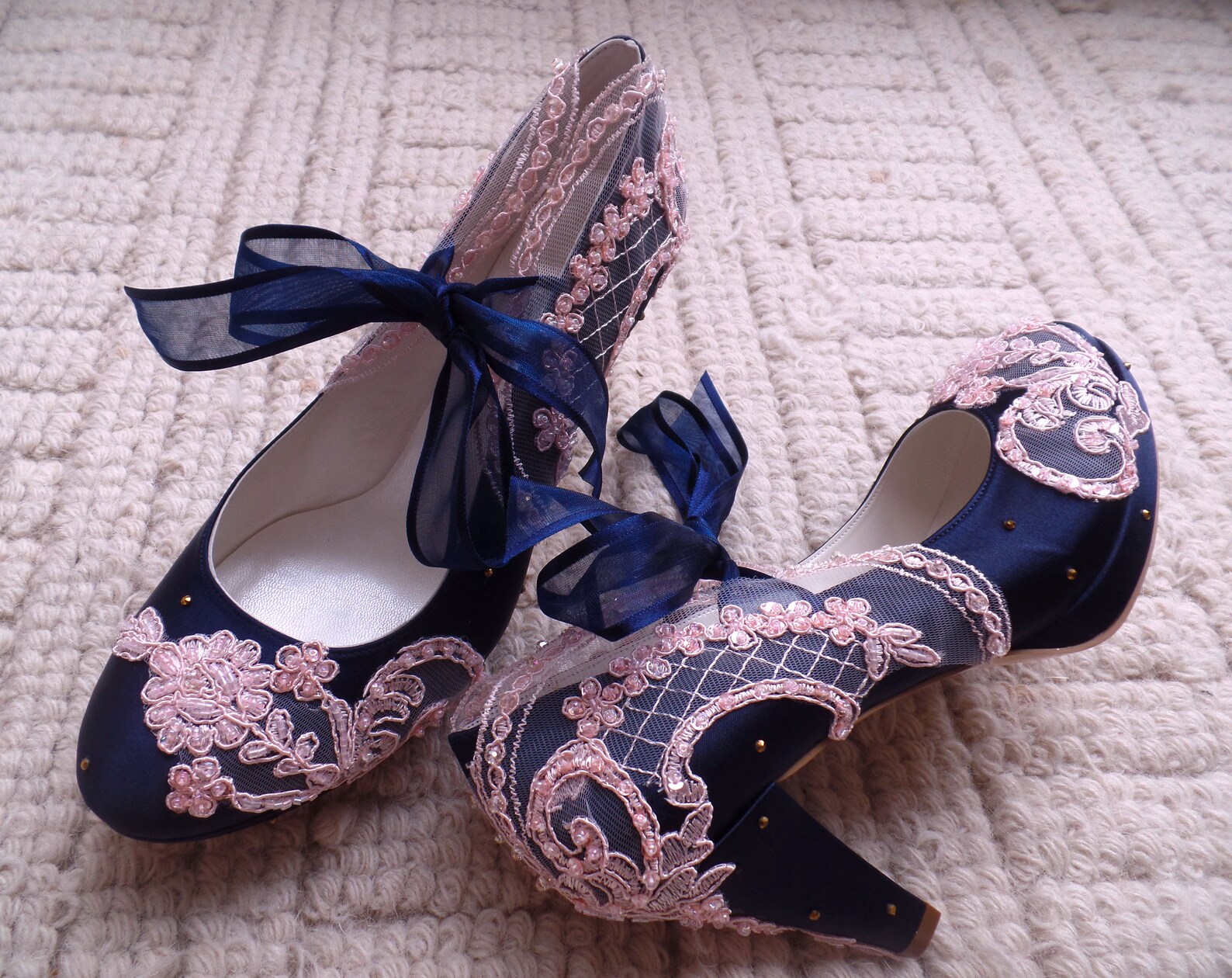 navy blue and pink shoes