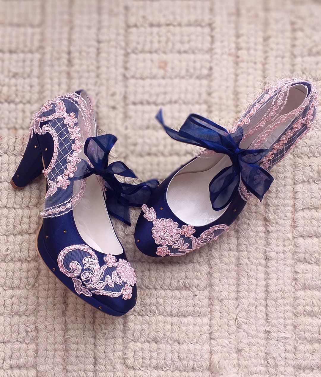 navy blue and pink shoes