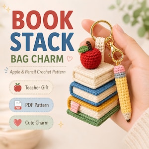 May include: A crochet bag charm featuring a stack of four small books in cream, blue, yellow, and green, topped with a red apple. A yellow and pink crochet pencil hangs from a gold-tone metal keyring. Text reads BOOK STACK BAG CHARM.