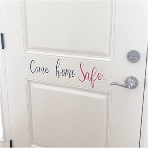 May include: White door with a black and red vinyl decal that reads "Come home safe."