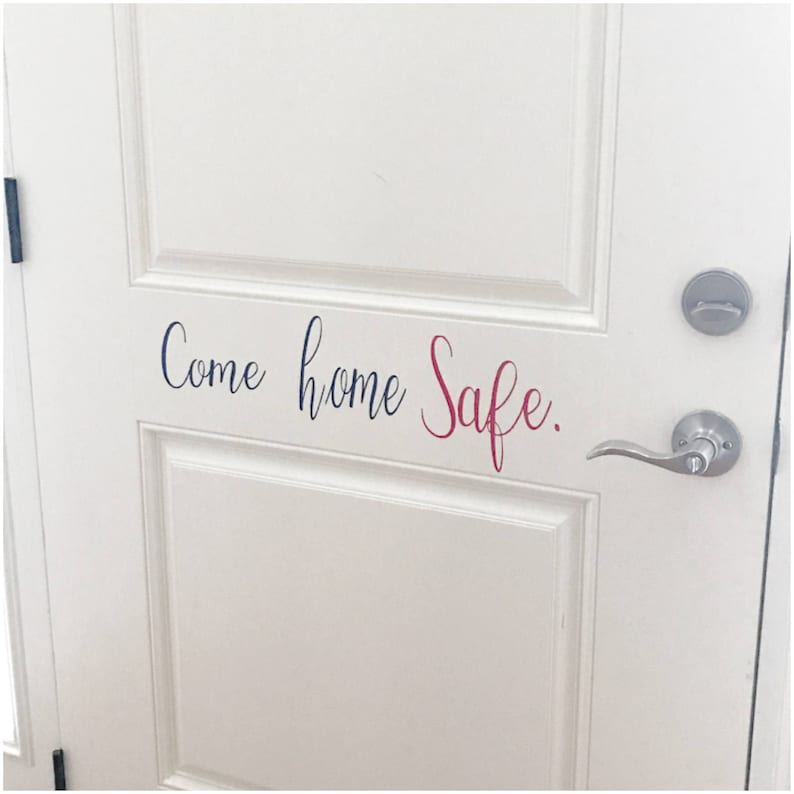 May include: White door with a black and red vinyl decal that reads "Come home safe."
