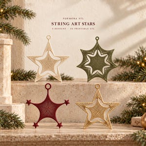 May include: Four star-shaped ornaments featuring intricate string art patterns. The text reads: FORMORA STL STRING ART STARS 4 DESIGNS 3D PRINTABLE STL. The ornaments are cream, olive green, dark red, and gold, each with a top loop for hanging.