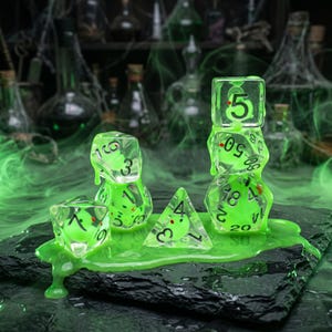 May include: A set of clear polyhedral dice with black numbers and small green inclusions, coated in a thick, glowing neon green slime. The dice are arranged in stacks and clusters on a dark, textured stone surface, surrounded by green mist.