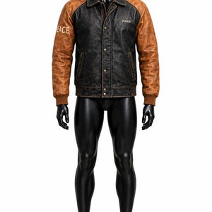 Chaqueta universitaria de cuero envejecido, bomber negra y coñac, estilo béisbol con botones a presión.