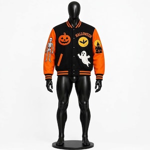May include: A black and orange varsity jacket featuring Halloween-themed patches including a skeleton, a jack-o'-lantern, a ghost, a bat, and a haunted house. The word HALLOWEEN is printed in orange above the bat patch on the front chest area.
