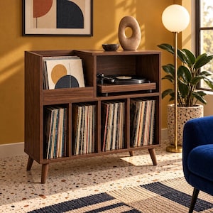 May include: A dark wood record player console featuring a top shelf for vinyl storage and a turntable, with four lower cubbies filled with vinyl records. The unit stands on four tapered legs and includes a smooth surface for displaying decorative items.
