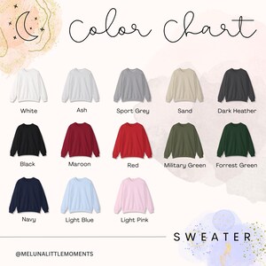 May include: A color chart for a crewneck sweater featuring thirteen color options: white, ash, sport grey, sand, dark heather, black, maroon, red, military green, forrest green, navy, light blue, and light pink. The text reads Color Chart and SWEATER.