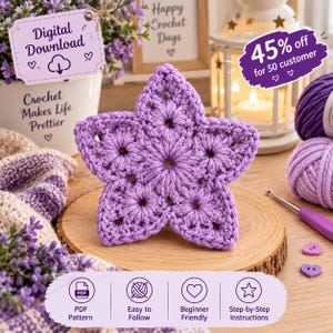 May include: A five-pointed star-shaped crochet motif in a light purple yarn. The design features a central circular pattern with radiating stitches forming the points. The motif is displayed on a circular wooden slice, showcasing the texture of the yarn.