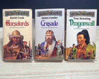May include: Three Forgotten Realms fantasy adventure paperbacks from The Empires Trilogy. The books are titled Horselords by David Cook, Crusade by James Lowder, and Dragonwall by Troy Denning, each featuring detailed character illustrations on the cover.