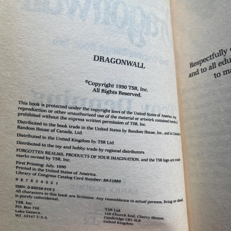 May include: The copyright page of the book Dragonwall, published in 1990 by TSR, Inc. The text includes the copyright notice, distribution information for the United States, Canada, and the United Kingdom, the ISBN 0-88038-919-2, and company addresses.
