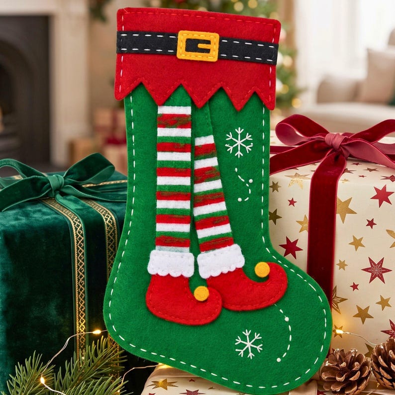 Christmas elf stocking sewing pattern pieces including stocking body, cuff, belt, buckle, elf legs, shoes, shoe cuffs, snowflakes and pom-poms.