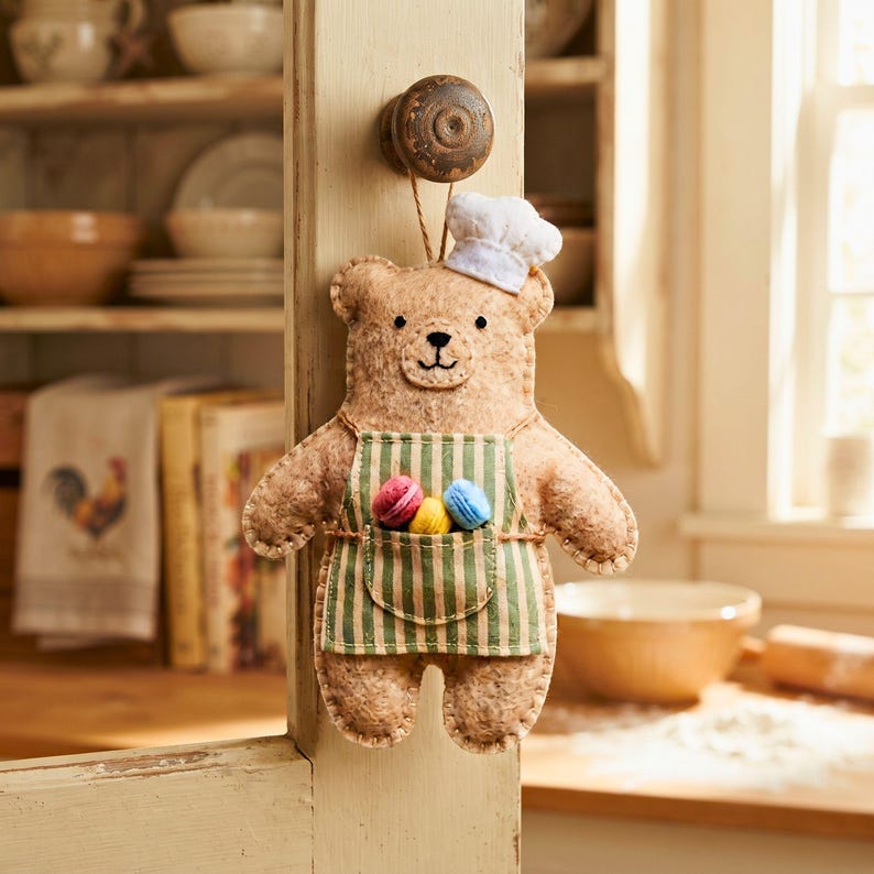 Cute Baker Bear felt ornament wearing a chef hat and green apron