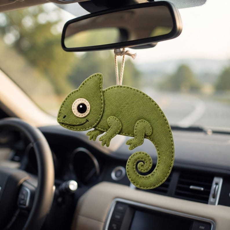 Felt chameleon ornament with embroidered smile and eye details